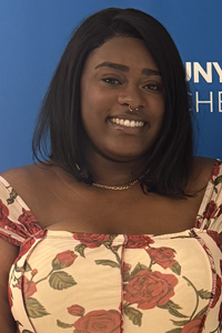 Headshot of Imani Romain-Barthley