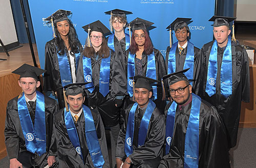 Early College High School graduates wearing their caps and gowns at Commencement in 2023.