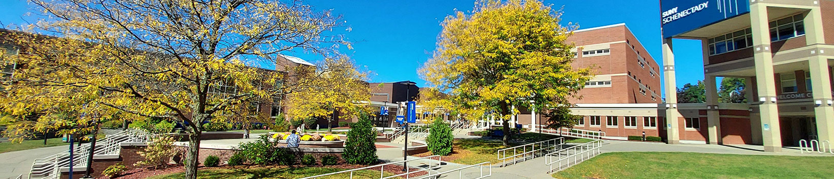 Panoramic image of the Quad, looking towards Stockade Building, Elston Hall on the right.