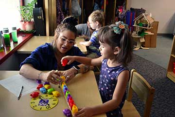 Early Childhood students working in the on-campus Laboratory Preschool.