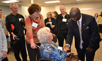 President Moono shaking hands with a donor.