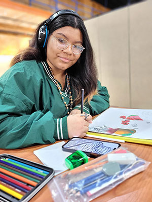 Art student working on a drawing.