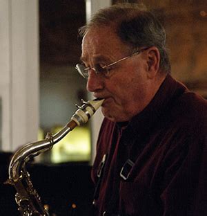 Leo Russo playing a saxophone. 