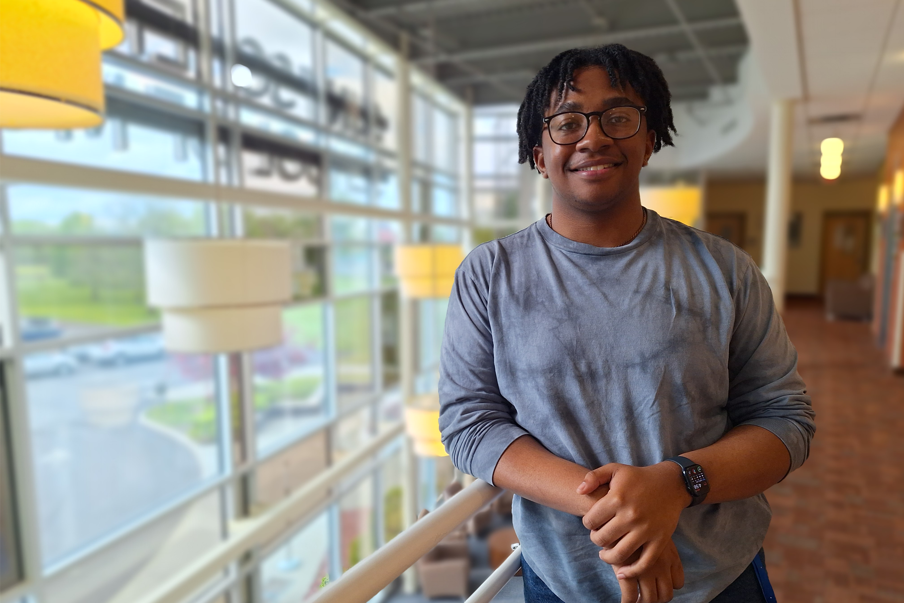 LayVon Scott standing in the lobby of the School of Music. 