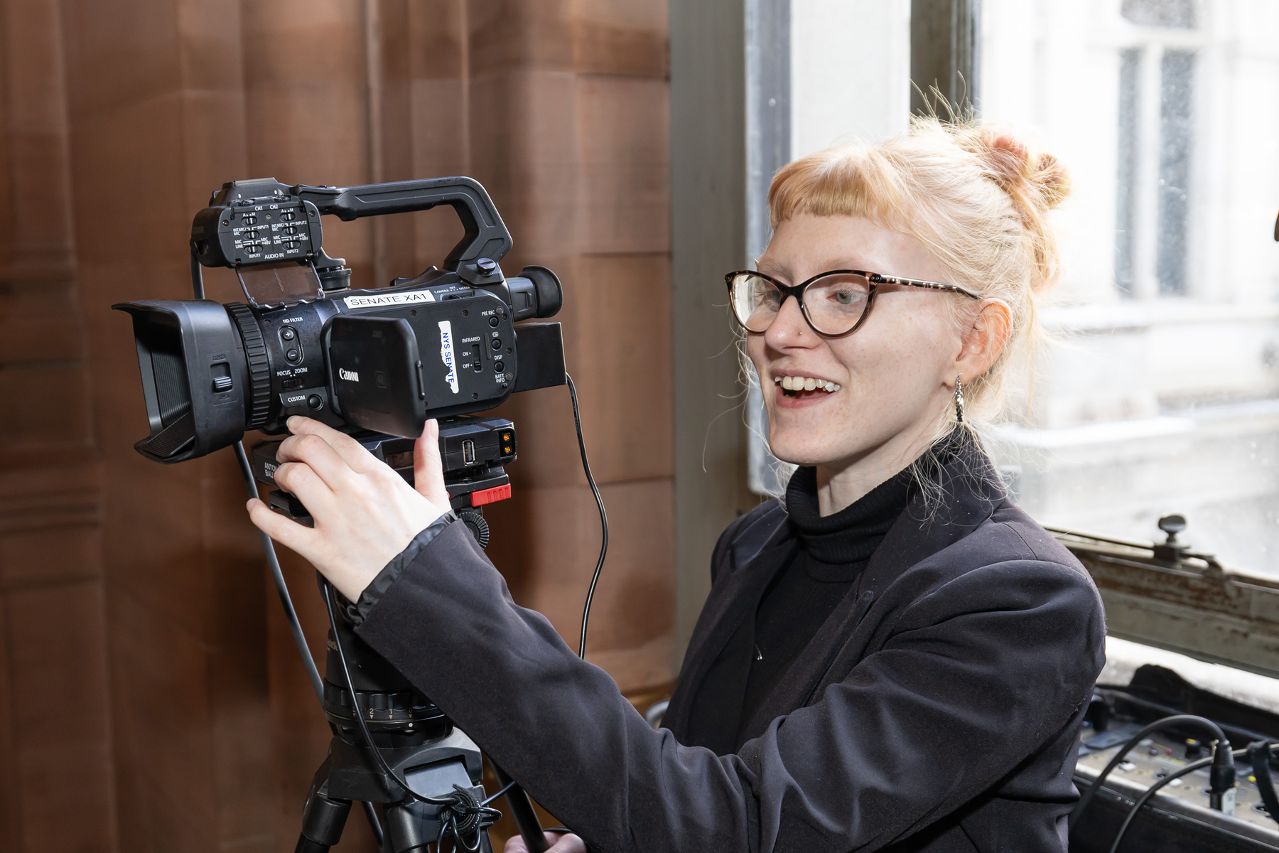 Madison Webb operating camera