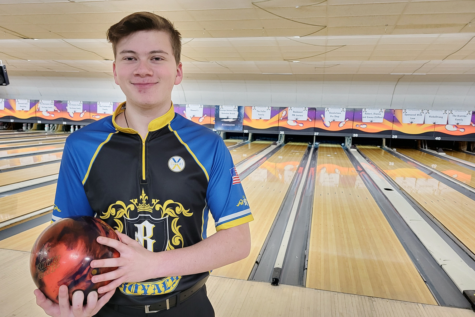 Jared Wachenheim holding bowling ball, at Boulevard Bowl